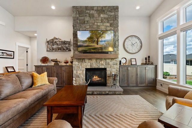 7203 S Tangle Heights Dr, Spokane, WA 99224 - living room with a stone fireplace, wood finished floors, and recessed lighting