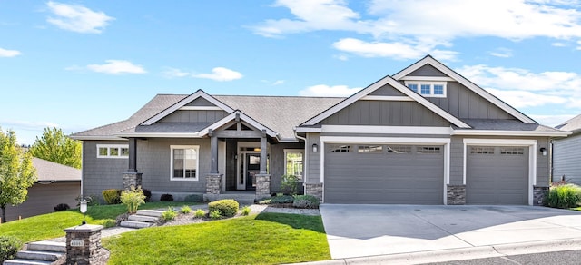 4305 S Bernson Ln, Spokane, WA 99223 - craftsman inspired home featuring an attached garage, board and batten siding, and a front lawn