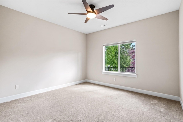 4305 S Bernson Ln, Spokane, WA 99223 - unfurnished room with baseboards, light carpet, and a ceiling fan