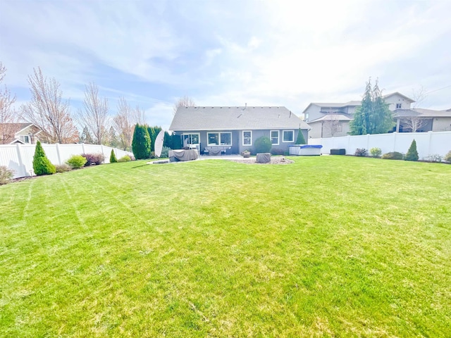 1602 S Canyon Woods Ln, Spokane, WA 99224 - back of house with a patio area and a hot tub