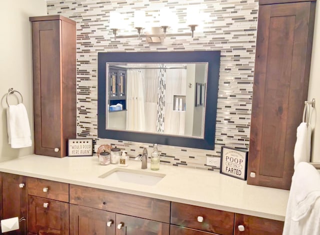1602 S Canyon Woods Ln, Spokane, WA 99224 - bathroom with vanity and decorative backsplash