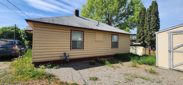 156 W 9th Ave, Colville, WA 99114 - view of property exterior featuring a chimney