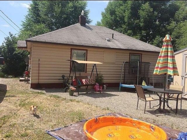 156 W 9th Ave, Colville, WA 99114 - back of house with a patio area