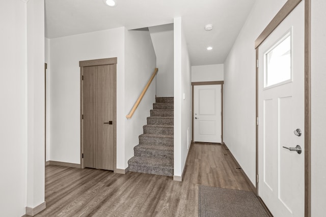 1116 Greenfield Dr, Cheney, WA 99004 - entrance foyer with wood finished floors, recessed lighting, stairway, and baseboards