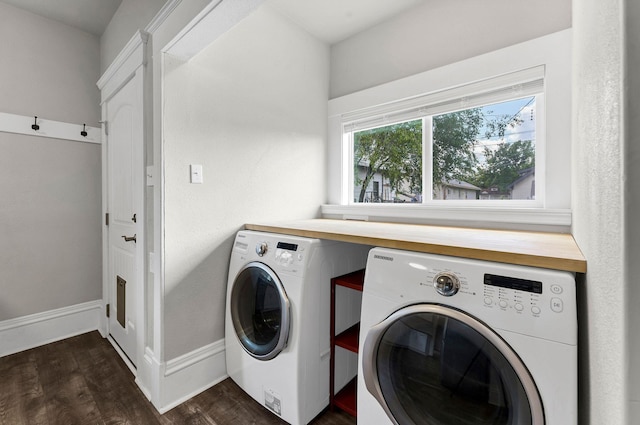 2305 W Sharp Ave, Spokane, WA 99201 - laundry room featuring washer and dryer, dark wood-type flooring, and baseboards