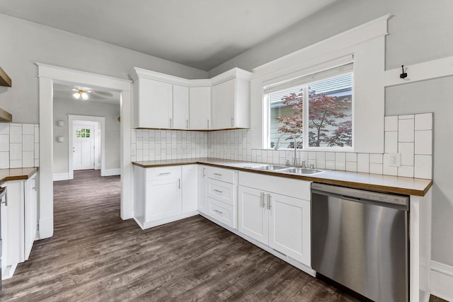 2305 W Sharp Ave, Spokane, WA 99201 - kitchen featuring dishwasher, a sink, dark wood-style flooring, and backsplash