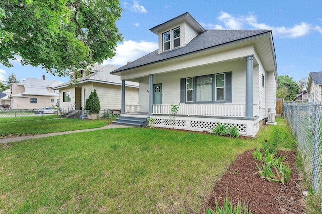 2305 W Sharp Ave, Spokane, WA 99201 - bungalow featuring a porch, a shingled roof, and central AC