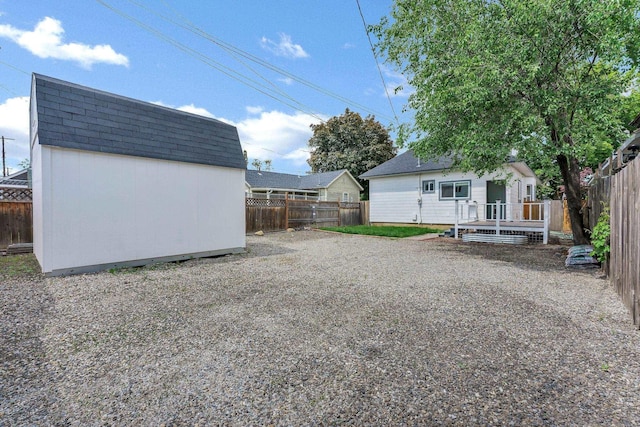 2305 W Sharp Ave, Spokane, WA 99201 - fenced backyard with a wooden deck