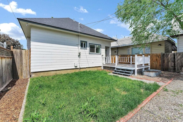 2305 W Sharp Ave, Spokane, WA 99201 - back of house with a wooden deck