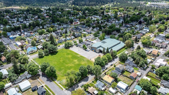 2305 W Sharp Ave, Spokane, WA 99201 - aerial overview of property's location featuring nearby suburban area and a heavily wooded area