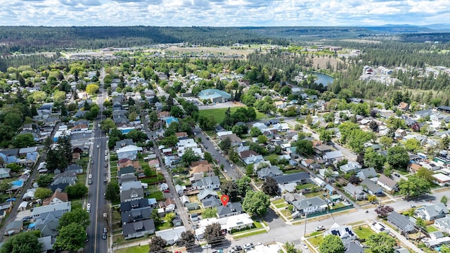 2305 W Sharp Ave, Spokane, WA 99201 - aerial overview of property's location with a forest and nearby suburban area
