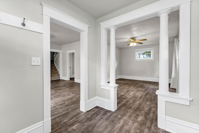 2305 W Sharp Ave, Spokane, WA 99201 - hallway featuring dark wood-type flooring, baseboards, and stairway