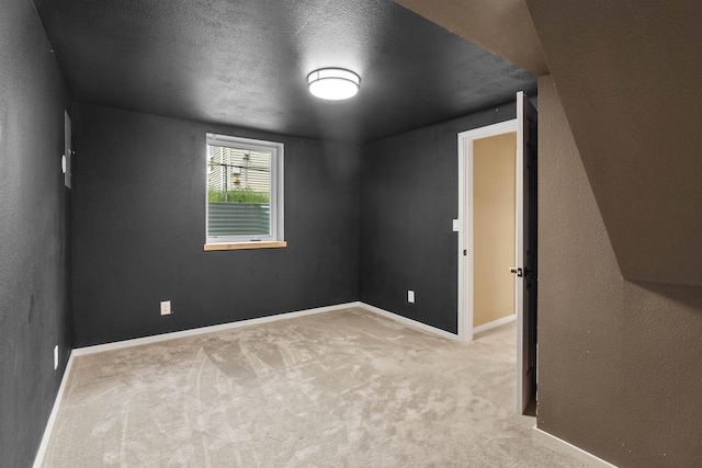 2417 W Euclid Ave, Spokane, WA 99205 - unfurnished room featuring baseboards and carpet flooring