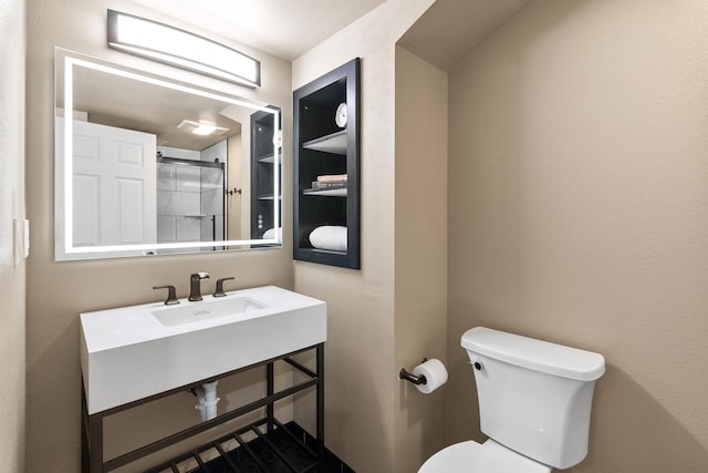 2417 W Euclid Ave, Spokane, WA 99205 - full bath featuring toilet, a sink, and a shower