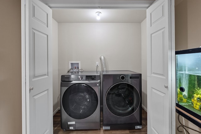 2417 W Euclid Ave, Spokane, WA 99205 - laundry area featuring washing machine and clothes dryer, wood finished floors, and baseboards