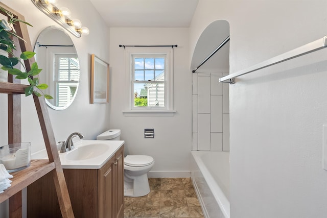 2417 W Euclid Ave, Spokane, WA 99205 - full bathroom with vanity, plenty of natural light, toilet, and  shower combination