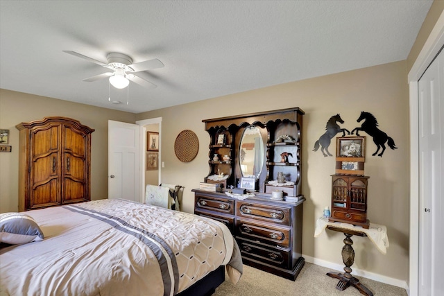 4921 W Londale Ct, Spokane, WA 99208 - carpeted bedroom featuring a closet, ceiling fan, and baseboards