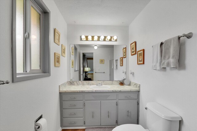 4921 W Londale Ct, Spokane, WA 99208 - bathroom featuring toilet and vanity