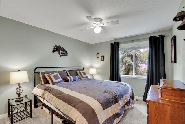 4921 W Londale Ct, Spokane, WA 99208 - carpeted bedroom with baseboards and a ceiling fan
