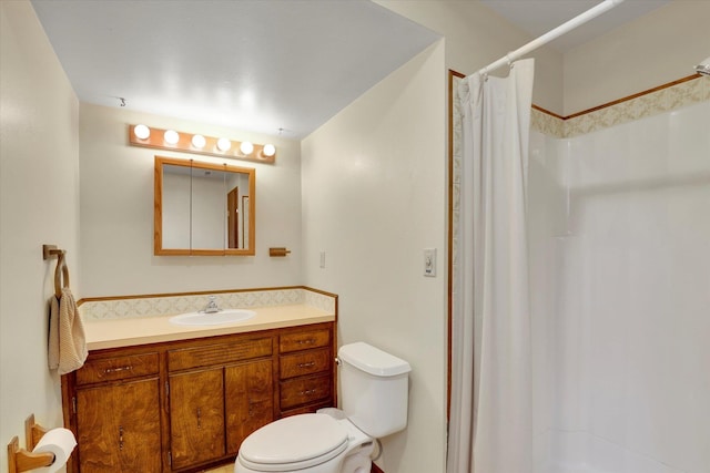 4921 W Londale Ct, Spokane, WA 99208 - bathroom featuring toilet, vanity, and a shower with shower curtain