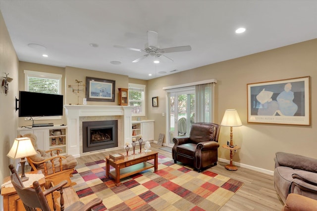 4921 W Londale Ct, Spokane, WA 99208 - living area with light wood-style flooring, ceiling fan, healthy amount of natural light, baseboards, and recessed lighting