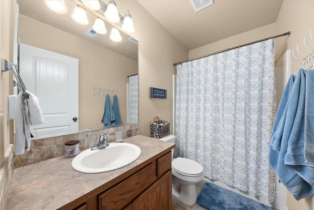 4031 S Bates Rd, Spokane Valley, WA 99206 - full bathroom featuring vanity, toilet, and a shower with curtain