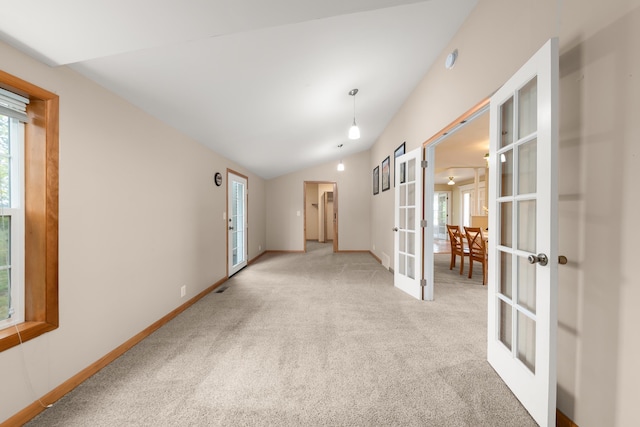 6325 W 48th Ave, Spokane, WA 99224 - unfurnished room with french doors, plenty of natural light, carpet, lofted ceiling, and baseboards