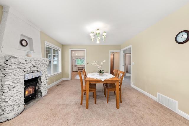 6325 W 48th Ave, Spokane, WA 99224 - dining space with a chandelier, light carpet, and baseboards