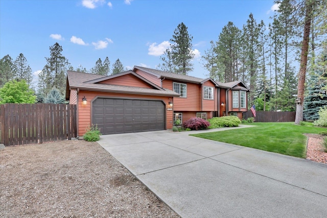 15711 N Unicorn Ct, Mead, WA 99021 - view of front of property featuring an attached garage and concrete driveway