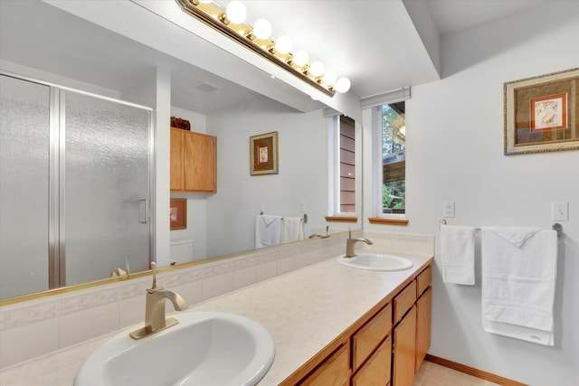 15711 N Unicorn Ct, Mead, WA 99021 - bathroom with double vanity and a stall shower