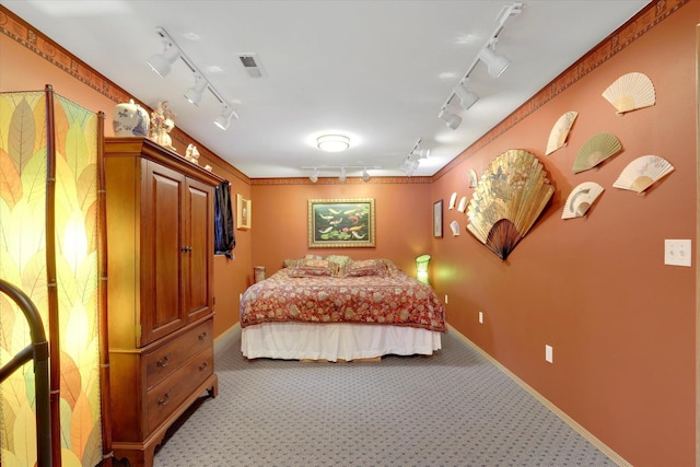15711 N Unicorn Ct, Mead, WA 99021 - carpeted bedroom with rail lighting and baseboards
