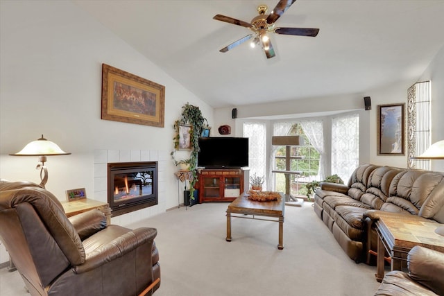 15711 N Unicorn Ct, Mead, WA 99021 - carpeted living area featuring ceiling fan, lofted ceiling, and a tiled fireplace