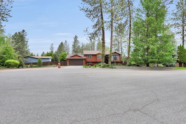 15711 N Unicorn Ct, Mead, WA 99021 - ranch-style house with a garage and concrete driveway