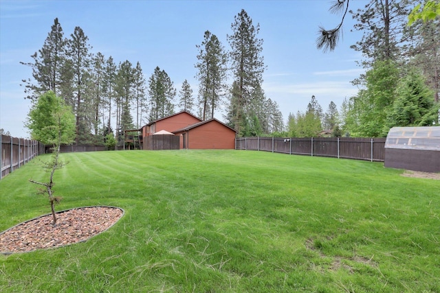 15711 N Unicorn Ct, Mead, WA 99021 - fenced backyard with an outbuilding