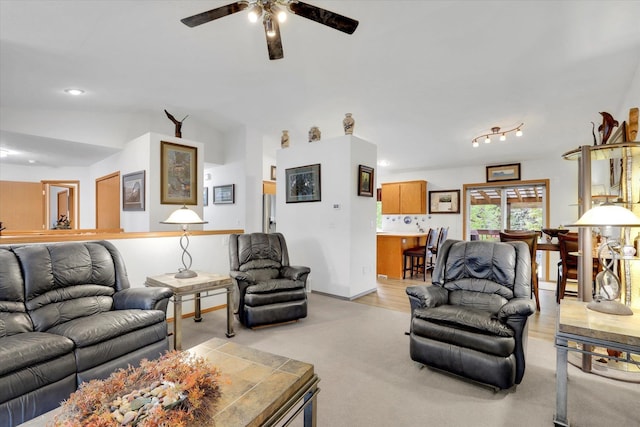 15711 N Unicorn Ct, Mead, WA 99021 - living room featuring a ceiling fan, light carpet, and lofted ceiling