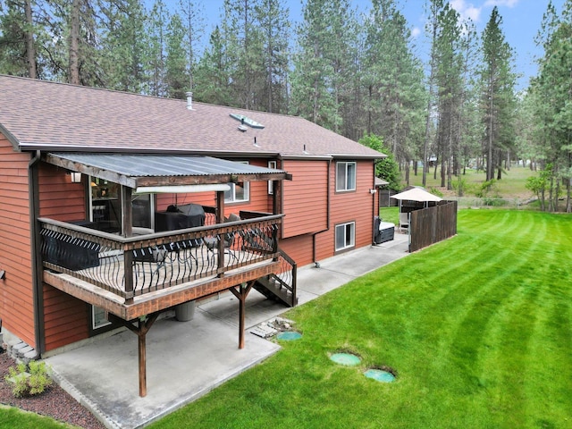15711 N Unicorn Ct, Mead, WA 99021 - back of property featuring a patio, roof with shingles, a lawn, a deck, and a gazebo