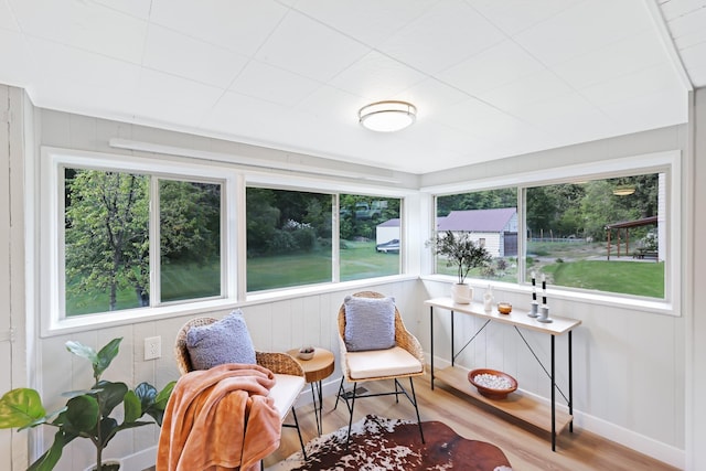 2526 E 8th Ave, Spokane, WA 99202 - sunroom / solarium featuring healthy amount of natural light, wood finished floors, and baseboards