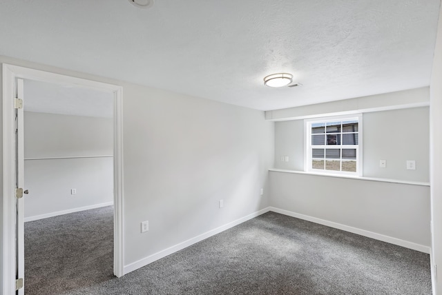 2526 E 8th Ave, Spokane, WA 99202 - carpeted spare room featuring a textured ceiling and baseboards