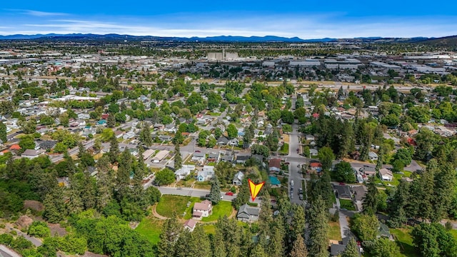 2526 E 8th Ave, Spokane, WA 99202 - aerial overview of property's location featuring mountains and nearby suburban area