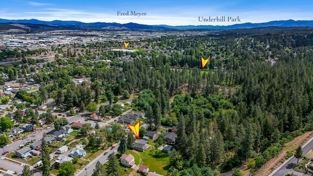 2526 E 8th Ave, Spokane, WA 99202 - aerial view of property's location with a mountainous background and a forest