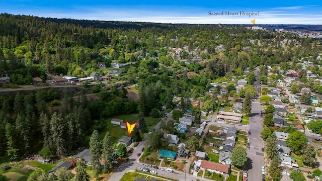 2526 E 8th Ave, Spokane, WA 99202 - aerial view of property and surrounding area with a heavily wooded area and nearby suburban area