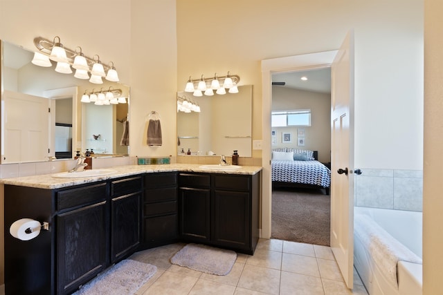18218 E Michielli Ave, Spokane Valley, WA 99016 - ensuite bathroom with double vanity, tile patterned floors, a bath, and a high ceiling