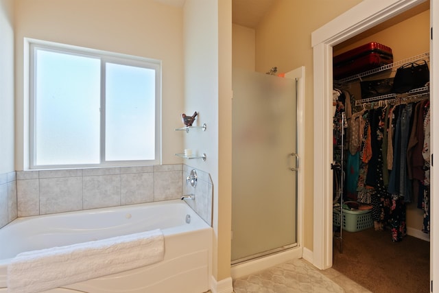 18218 E Michielli Ave, Spokane Valley, WA 99016 - full bathroom featuring a shower stall, a bath, and a spacious closet