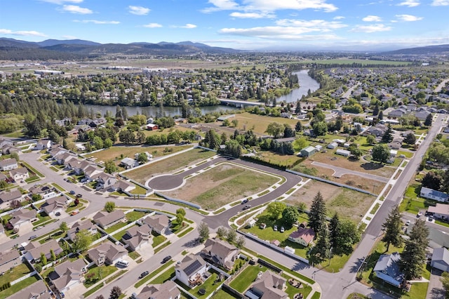 18218 E Michielli Ave, Spokane Valley, WA 99016 - aerial view of property's location with a water and mountain view and nearby suburban area