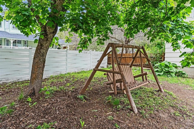 122 E Circle Dr, Newport, WA 99156 - fenced backyard featuring a playground
