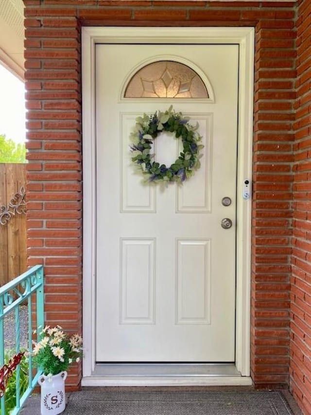 536 E 1st Ave, Colville, WA 99114 - doorway to property featuring brick siding