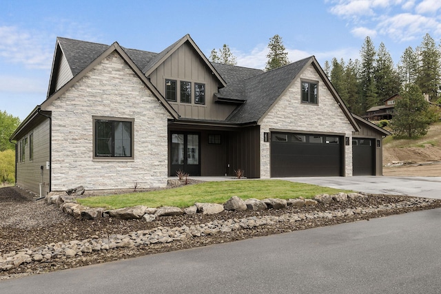 11711 E Honeycomb Springs Ln, Spokane, WA 99206 - view of front of property with board and batten siding, stone siding, concrete driveway, and roof with shingles