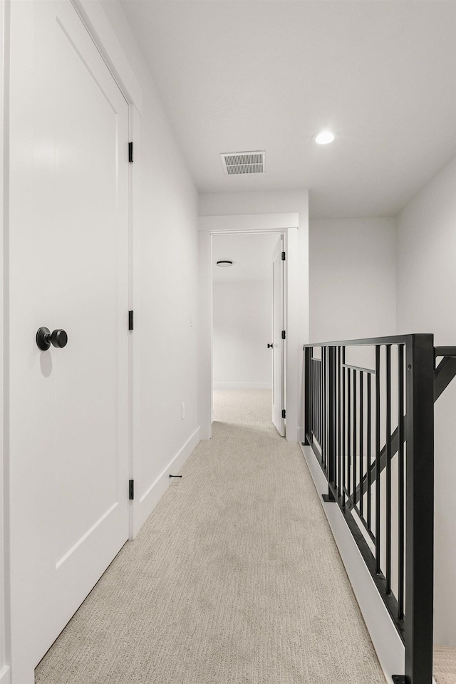 11711 E Honeycomb Springs Ln, Spokane, WA 99206 - hallway with carpet, an upstairs landing, recessed lighting, and baseboards