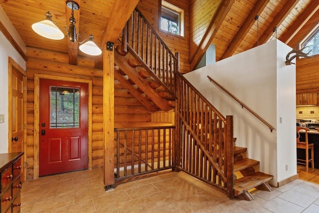 3947 N Deer Lake Rd, Loon Lake, WA 99148 - foyer with wood ceiling with exposed beams, healthy amount of natural light, rustic walls, stairs, and light tile patterned flooring