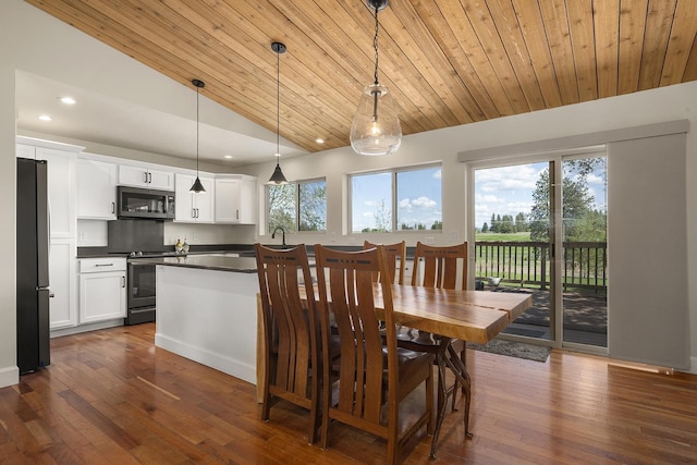10409 E Palouse Hwy, Valleyford, WA 99036 - dining space featuring lofted ceiling, dark wood-style floors, recessed lighting, and wooden ceiling